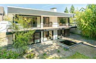 Haus kaufen in 41515 Grevenbroich, Stilvoller Bauhaus-Bungalow mit Wellnessbereich in attraktivem Wohnumfeld