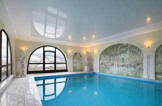 Villa kaufen in 63825 Blankenbach, Architektenvilla in ruhiger Hanglage mit Wellnessbereich und Koiteich
