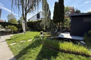 Haus kaufen in 55296 Gau-Bischofsheim, Charmantes Drei-Generationen-Haus in ruhiger Lage von Gau-Bischofsheim mit idyllischem Garten