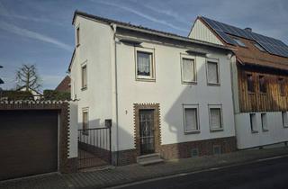 Einfamilienhaus kaufen in 61130 Nidderau, Charmantes Einfamilienhaus mit Garage, Nebengebäude und viel Potenzial in Nidderau-Heldenbergen