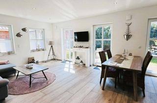 Wohnung kaufen in 26736 Krummhörn, Exklusive und neuwertige EG-Wohnung mit Garten und PKW-Stellplatz in ruhiger Wohnlage