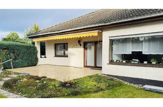 Einfamilienhaus kaufen in 34292 Ahnatal, Ahnatal - Attraktiver Walmdach-Bungalow mit Doppelgarage in ruhiger sonniger Lage