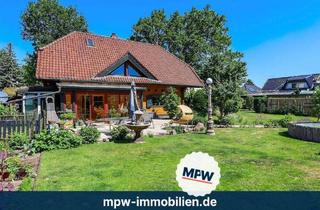 Einfamilienhaus kaufen in 12557 Berlin, Berlin - Ein Stück Tirol in Köpenick: Alpencharme auf sonnigem Grundstück