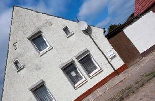 Einfamilienhaus kaufen in 39240 Calbe, Calbe (Saale) - Einfamilienhaus mit Gartenland