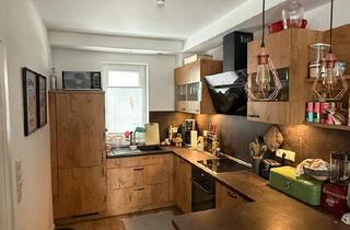 Wohnung kaufen in 49661 Cloppenburg, Cloppenburg - Wohnung (EG) in zentraler Lage mit Garten