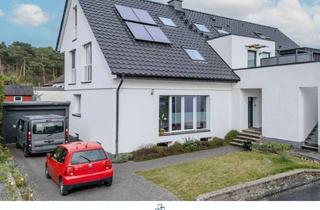 Wohnung kaufen in 33104 Paderborn, Familienfreundliche Erdgeschosswohnung mit Hauscharakter, Garten & Terrasse in ruhiger Sackgasse