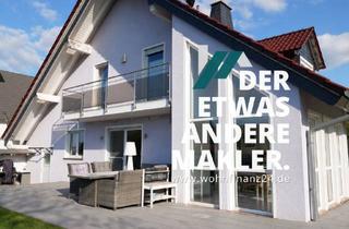 Haus kaufen in 55234 Wendelsheim, Lebensqualität pur - großzügiges Wohnen mit Design, Sauna & Naturblick