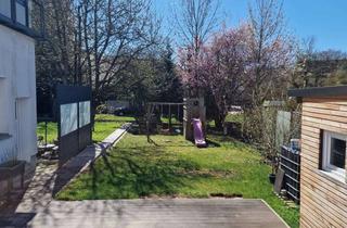 Wohnung kaufen in 34225 Baunatal, Erdgeschosswohnung mit großem Garten in Baunatal Großenritte