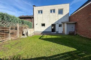 Wohnung kaufen in 47918 Tönisvorst, Grün wohnen im Zentrum: Wohnung mit Garten in St. Tönis