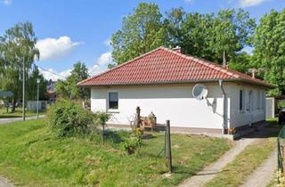 Haus kaufen in 23974 Neuburg, Gemütlicher Bungalow mit Kamin, Terrasse und Einbauküche in Ostseenähe