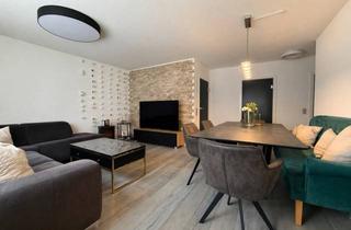 Wohnung kaufen in 73061 Ebersbach, Stilvoll modernisierte EG-Wohnung mit Südbalkon & Tiefgarage in zentraler Lage, Ebersbach