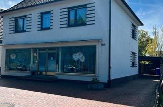 Einfamilienhaus kaufen in 33330 Gütersloh, Gütersloh - Einfamilienhaus mit vermieteter Gewerbefläche in Gütersloh