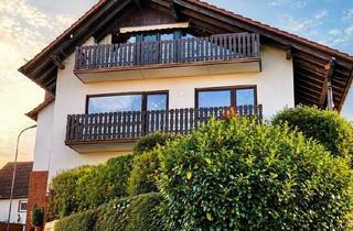 Haus kaufen in 67722 Winnweiler, Winnweiler - Freistehendes Wohnhaus mit Garten, Loggia und Garagen