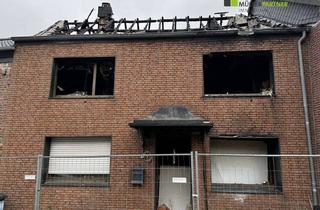 Haus kaufen in 52445 Titz, Abriss und Neubau nach Brandschaden eines Hauses in Titz
