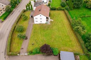 Haus kaufen in 89079 Donaustetten, Projektgrundstück mit Bestand: 3.111 m² inkl. Zweifamilienhaus und 9 Garagen