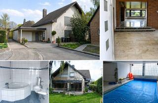 Haus kaufen in Neue Weide 35, 52499 Baesweiler, Architekten-Klassiker mit Indoor-Pool, Sauna & Empore: Großzügiges Wohnen in Baesweiler-Setterich