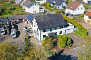 Haus kaufen in 36119 Neuhof, Wohnhaus mit vermieteter Gewerbefläche – komfortables Wohnen und sichere Rendite in einen!