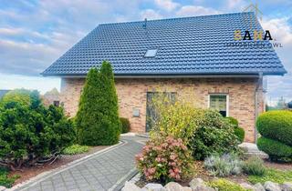 Einfamilienhaus kaufen in 49328 Melle, Charmantes Klinker-Einfamilienhaus mit Doppelgarage in Melle-Bennien