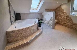 Haus kaufen in 91475 Lonnerstadt, Großzügiges Zweifamilienhaus mit Maisonettewohnung und weitläufigem Garten