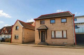 Haus kaufen in 41542 Dormagen, Zwei Häuser, ein Zuhause