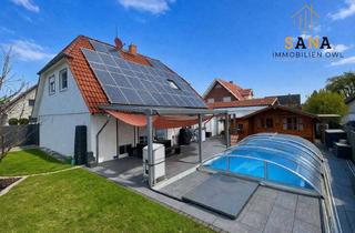 Einfamilienhaus kaufen in 32457 Porta Westfalica, Freundliches Einfamilienhaus mit Pool, Sauna und Photovoltaikanlage in Porta Westfalica-Eisbergen