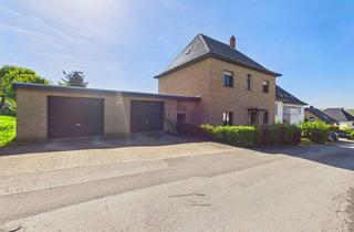 Haus kaufen in 32584 Löhne, ZFH mit 1.129 m² Grundstück – 118 m², 2 Einheiten, Garagen & Potenzial