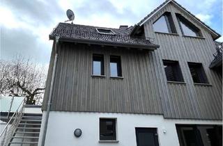 Wohnung kaufen in 35625 Hüttenberg, Hüttenberg - Moderne 3-Zimmer-Maisonette-Wohnung mit Hauscharakter & Erdwärme