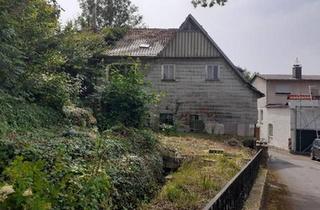 Haus kaufen in 37242 Bad Sooden-Allendorf, Bad Sooden-Allendorf - Fachwerkhaus Sanierungsfall und große Scheune, Garagen