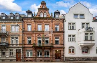 Wohnung kaufen in 79098 Altstadt, Charmante Altbauwohnung mit großem Balkon im Denkmalobjekt in der FR-Altstadt - vermietet!