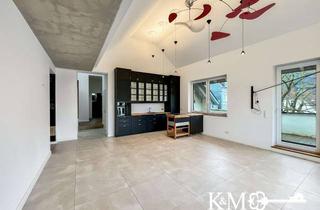 Wohnung kaufen in 56626 Andernach, Dachgeschoss-Rarität im Denkmalensemble: 134 m² mit Rheinblick & Balkon