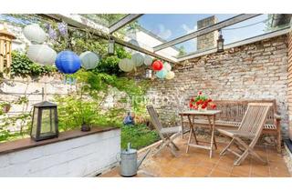 Wohnung kaufen in 41460 Neuss, Besondere Wohnung im Bungalowstil in Neuss mit Terrasse, Garten und Photovoltaik