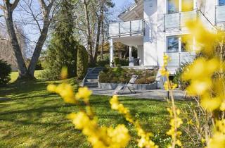 Wohnung kaufen in 82418 Murnau, Stilvolle Gartenwohnung mit Bergblick und gehobenem Wohnkomfort