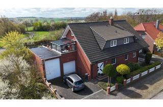 Haus kaufen in 38446 Reislingen, Vielseitiges Wohnjuwel: Haus mit zwei Einliegerwohnungen, Vollkeller & geräumiger Doppelgarage & Ca