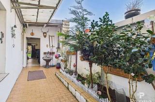 Haus kaufen in 52382 Niederzier, Gepflegtes Reihenmittelhaus in zentraler Lage von Niederzier-Oberzier