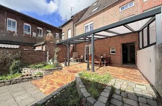 Haus kaufen in 47877 Willich, Mehr Platz, mehr Garten, mehr Wohlfühlen: Stadthaus mit vermietetem EG