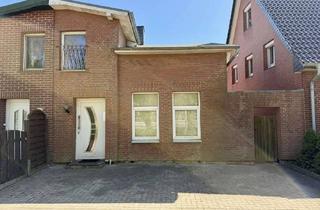 Doppelhaushälfte kaufen in 25761 Büsum, Sanierungsbedürftige Doppelhaushälfte mit Ausbaupotenzial in gewachsener Lage