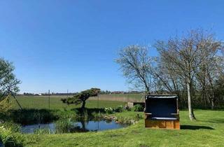 Haus kaufen in 25845 Nordstrand, Stilvolles Landhaus mit großem Garten und wunderschönem Blick