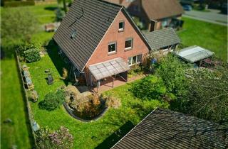 Haus kaufen in 26655 Westerstede, Zweifamilienhaus in ruhiger Lage von Westerstede-Linswege