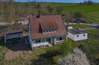 Haus kaufen in 36142 Tann, Teilsaniertes Wohnhaus mit Weitblick in Tann-Wendershausen