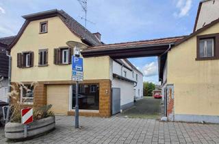 Haus kaufen in 65479 Raunheim, Großzügiger Bauplatz und Bestand auf 936 m²: 3-Familienhaus (+Laden) mit Entwicklungsspielraum