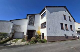 Einfamilienhaus kaufen in 63110 Rodgau, Großzügiges Einfamilienhaus mit viel Potenzial in guter Lage von Rodgau – sanierungsbedürftig
