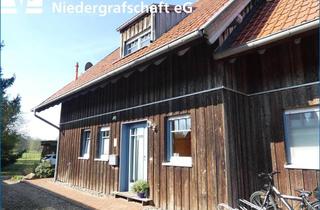 Doppelhaushälfte kaufen in 49843 Uelsen, Doppelhaushälfte mit großem Garten