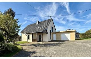 Einfamilienhaus kaufen in 54616 Winterspelt, Winterspelt - Top Einfamilienhaus mit großzügigem Grundstück und Garage - Ihr neues Zuhause mit Wohlfühlcharakter