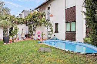 Haus kaufen in 53229 Bonn, Bonn - Große Wohnung mit Garten und Praxis im unteren Bonn-Holzlar