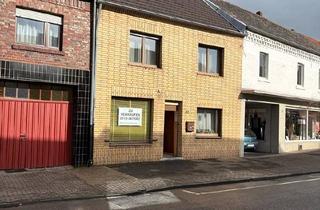 Haus kaufen in 41836 Hückelhoven, Hückelhoven - Interessantes Wohnhaus mit einem Ladenlokal in Hückelhoven