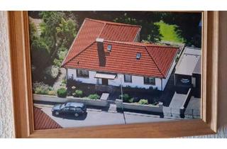 Haus kaufen in 55296 Harxheim, Harxheim - Bungalow Massivbauweise 19721973 mit Garage, Stellplatz, Garten