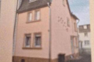 Haus kaufen in 56204 Hillscheid, Hillscheid - Kleines Haus mit Nebengebäude und Garage als Kapitalanlage