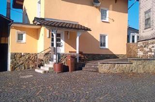Einfamilienhaus kaufen in 35781 Weilburg, Weilburg - Einfamilienhaus mit zwei Nebengebäuden mit großem Wohnzimmer