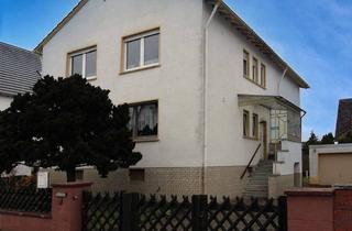 Haus kaufen in 64390 Erzhausen, Erzhausen - Viel Platz zum Wohlfühlen - Zweifamilienhaus mit großem Garten in ruhiger Lage