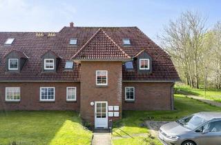 Wohnung kaufen in 25836 Garding, Modernisierte Erdgeschosswohnung mit Wintergarten & eigenem Garten
